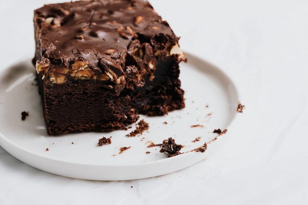 A delectable chocolate brownie, perfectly baked and fudgy in texture.